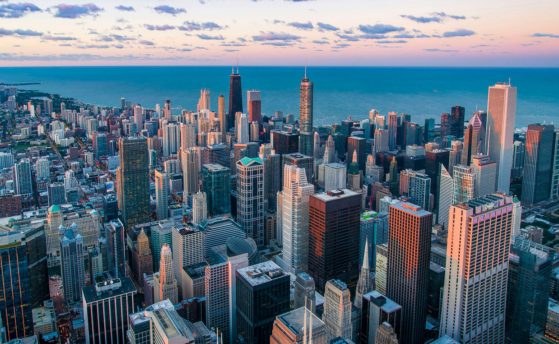 Chicago skyline at dusk — DJ-Chicago serving Chicagoland weddings and events since 2000